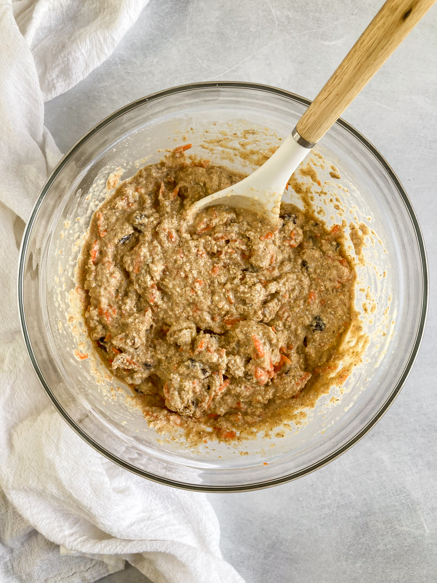 Dry and wet ingredients mixed together in a bowl.