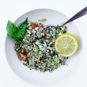 A bowl of lentil harvest grain salad.