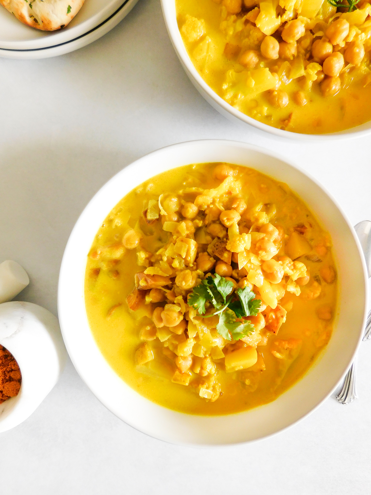 A bowl of Cauliflower Potato Curry. 