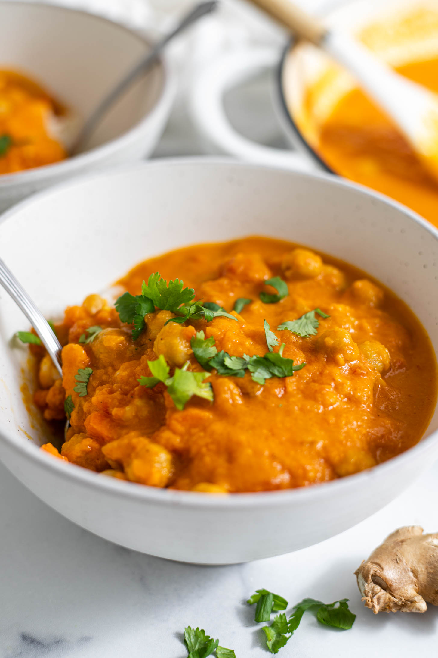 Sweet potato curry with chickpeas in a bowl.