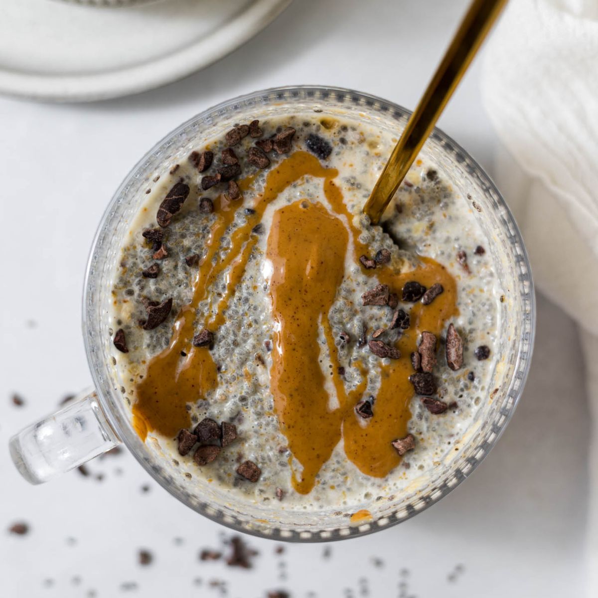 Peanut butter chia pudding with a peanut butter drizzle.