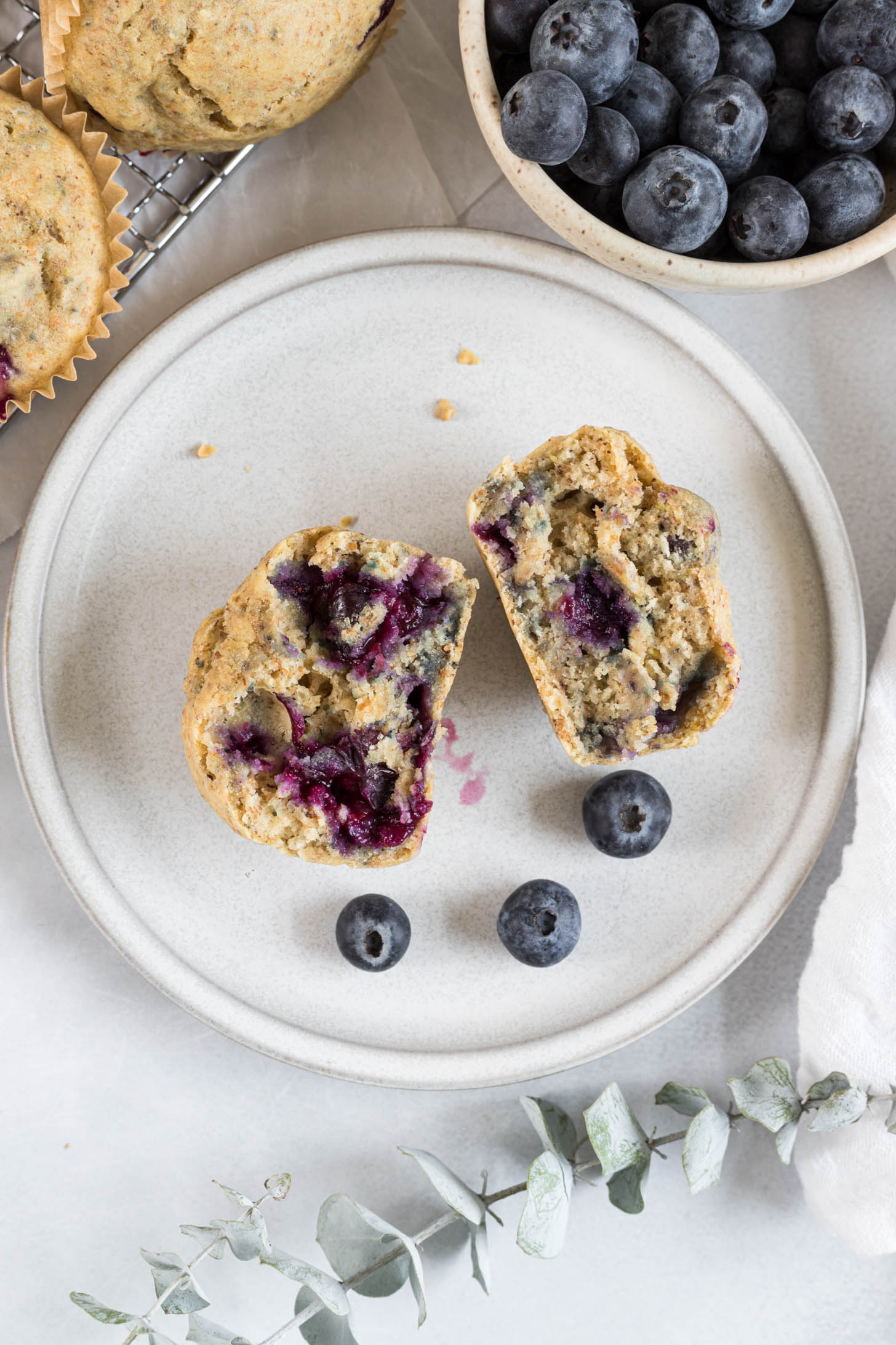 A blueberry muffin cut in half.