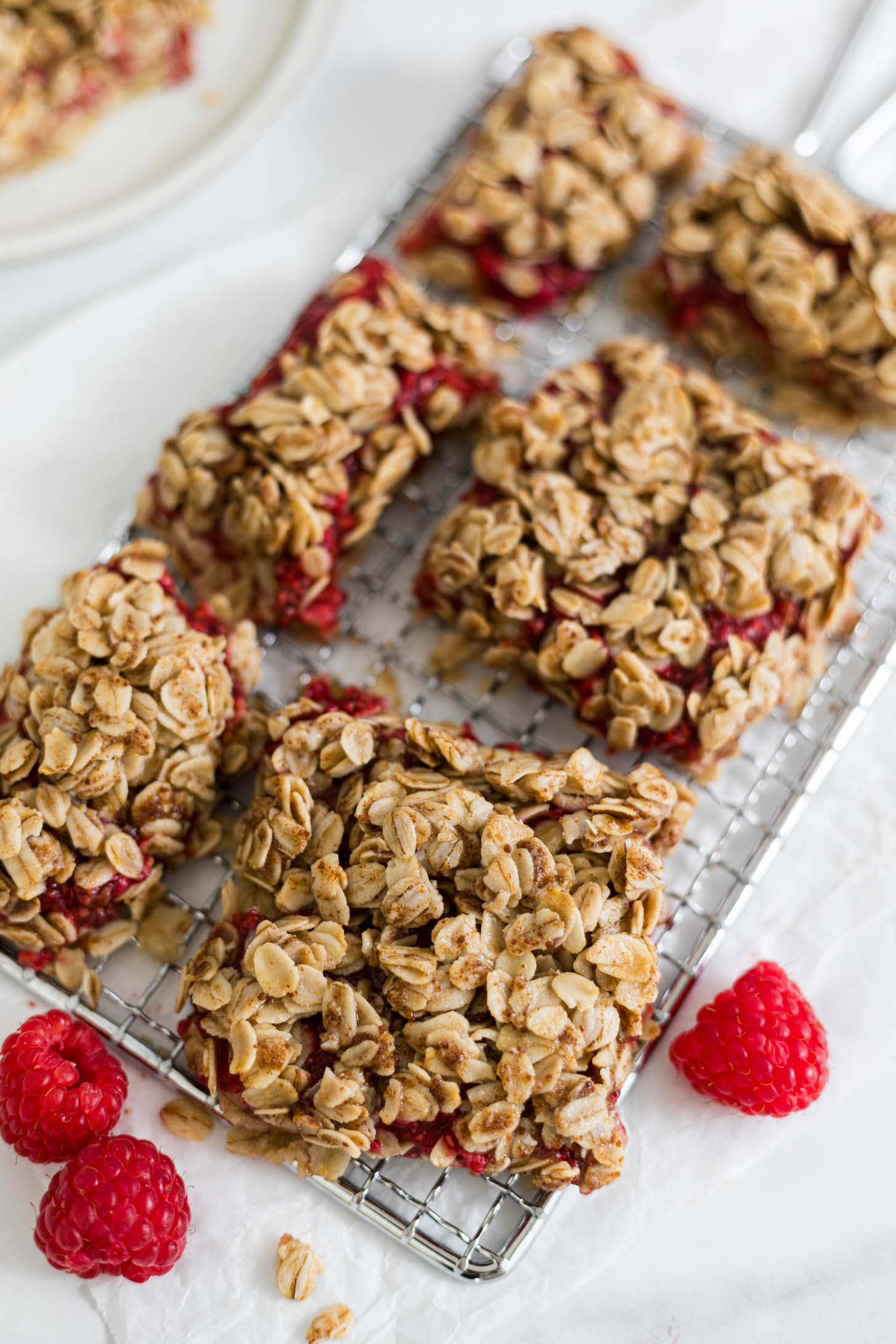 Overhead view of raspberry bars cut into slices.