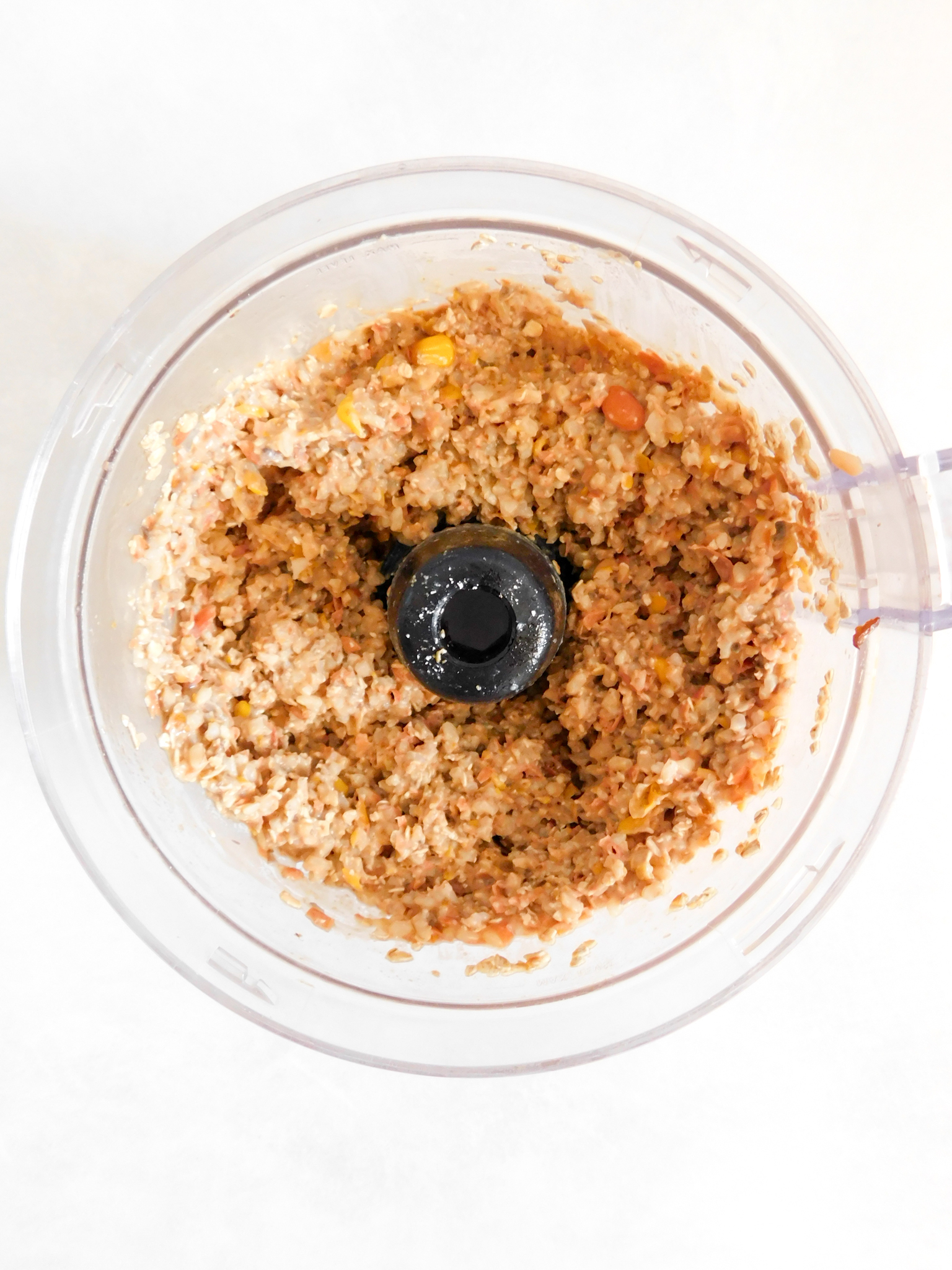 Burger mixture in a food processor.