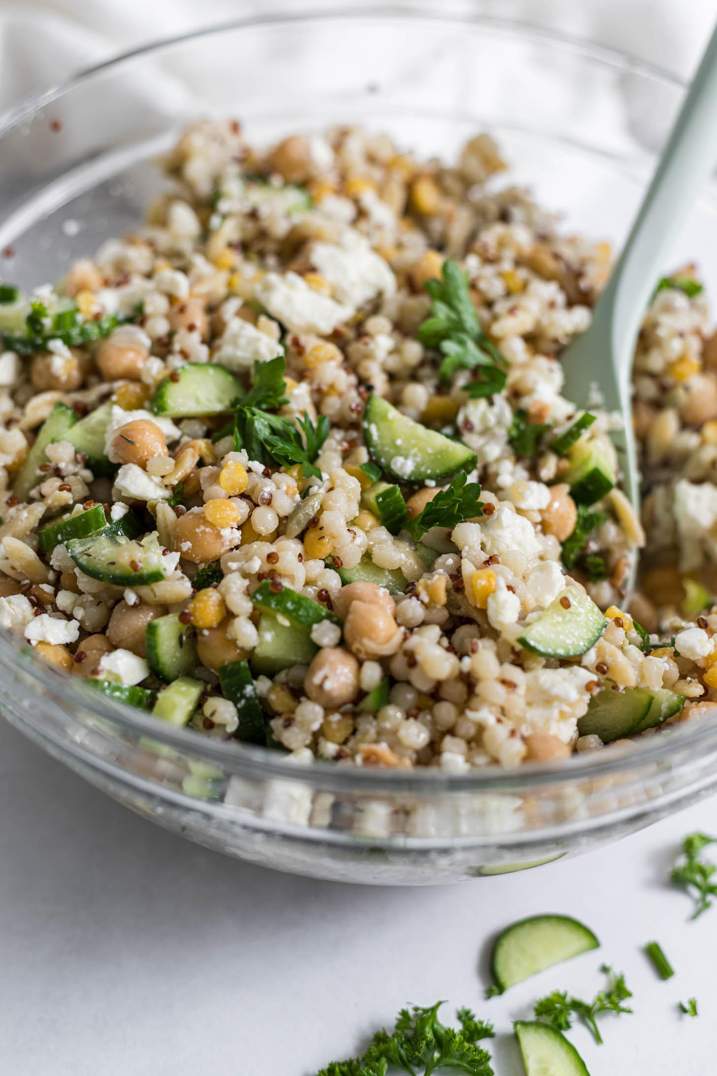 Vinaigrette mixed in with the salad ingredients.