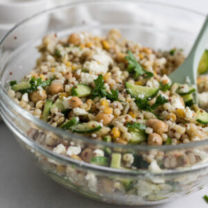 Harvest Grain Salad in a large bowl with a spoon in it.