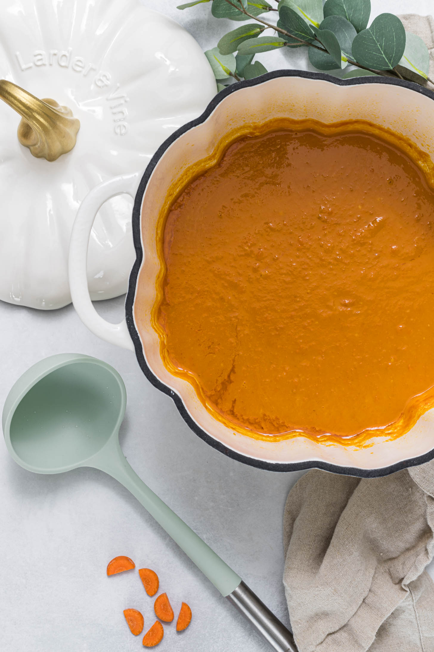 Sweet potato soup prepared in a pumpkin dutch oven.