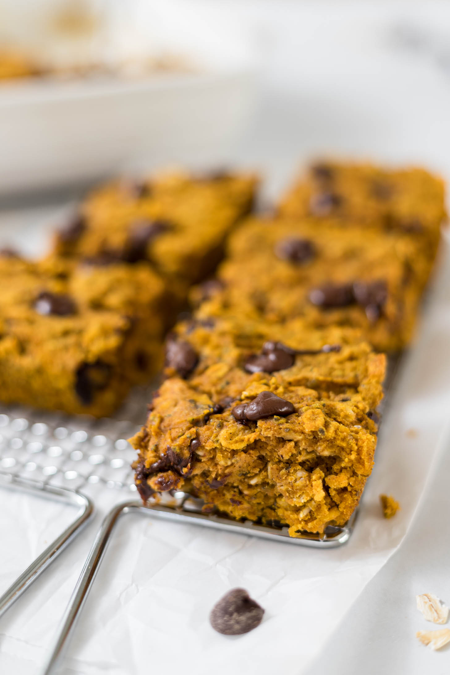 Pumpkin bars on a wire rack.