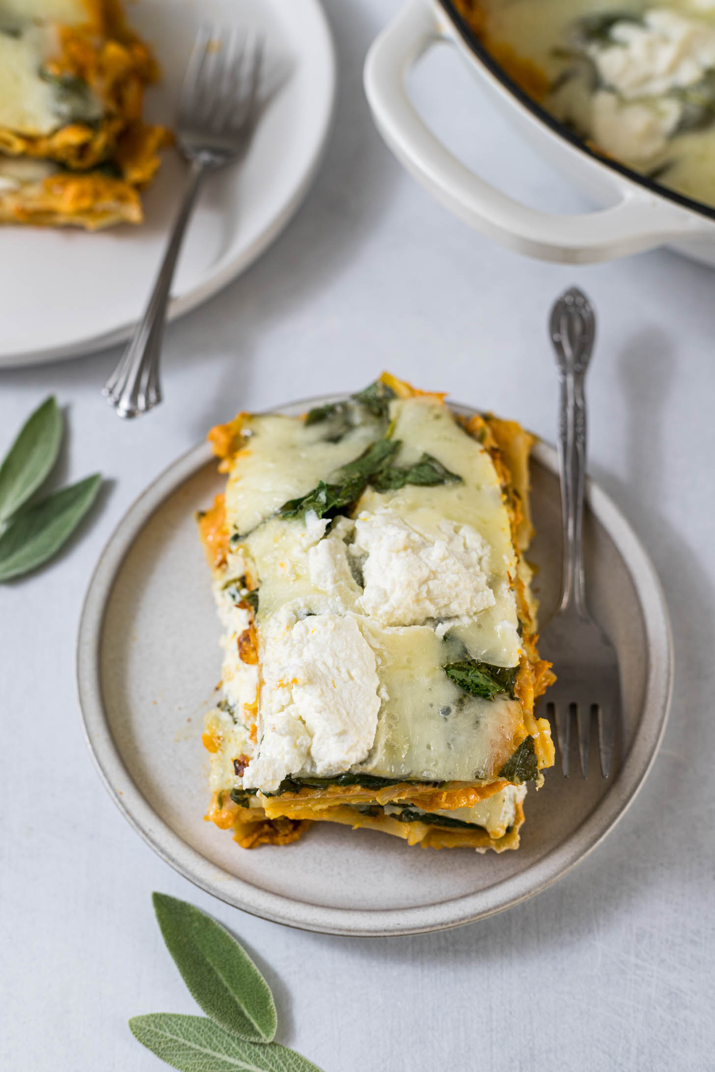 Slice of lasagna with pumpkin.