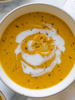 Pumpkin cauliflower soup in a bowl.